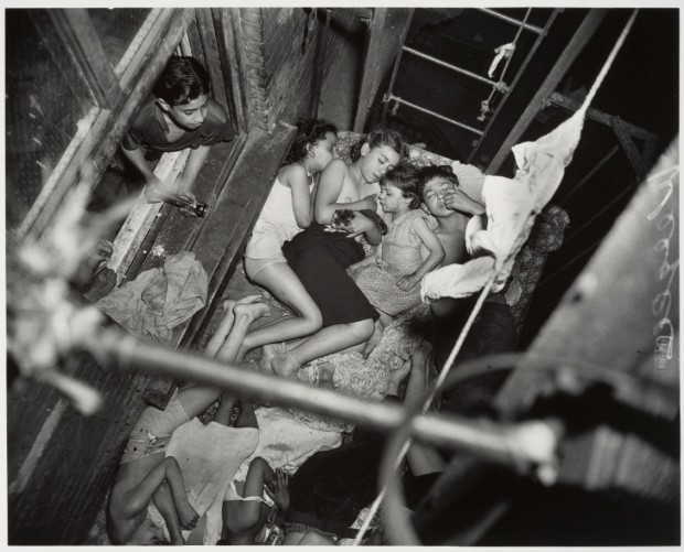 Weegee-Children-Family-Sleeping-on-a-Fire-Escape-1938