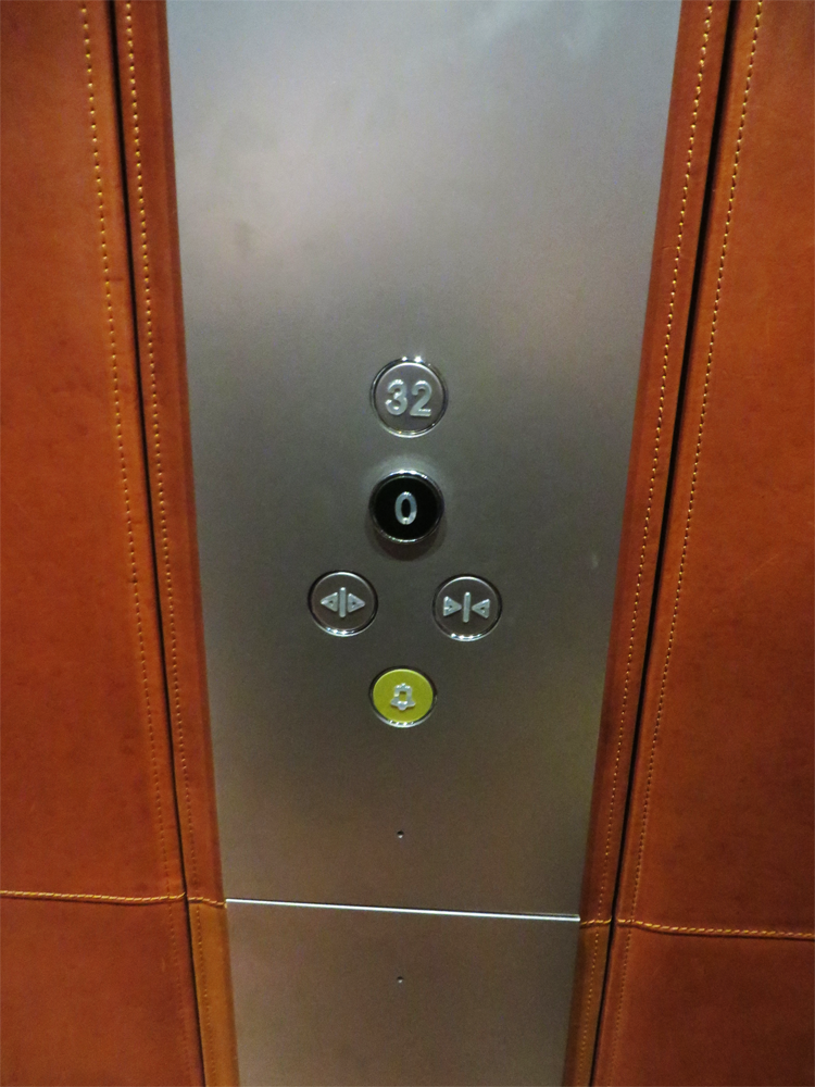 the two-button elevator panel at The Shard in London