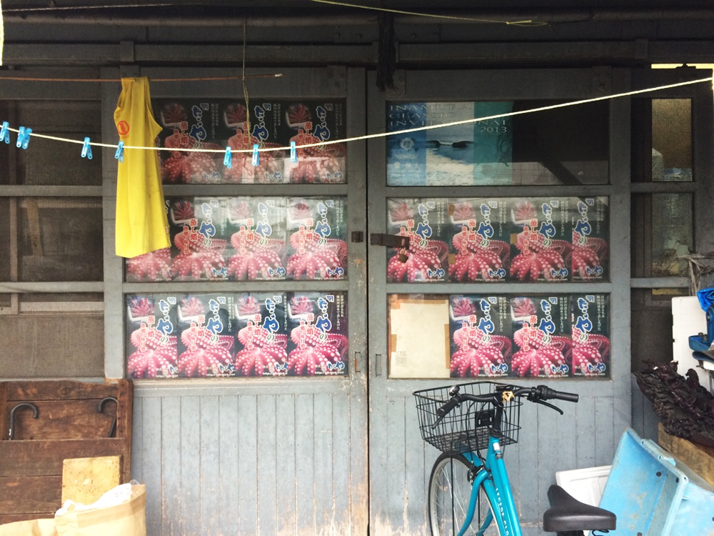 Octopus posters in a window at Tokyo's Tsukiji Market