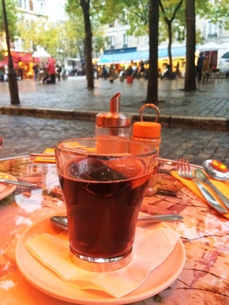 A cup of hot wine at Place de Tertre in Paris