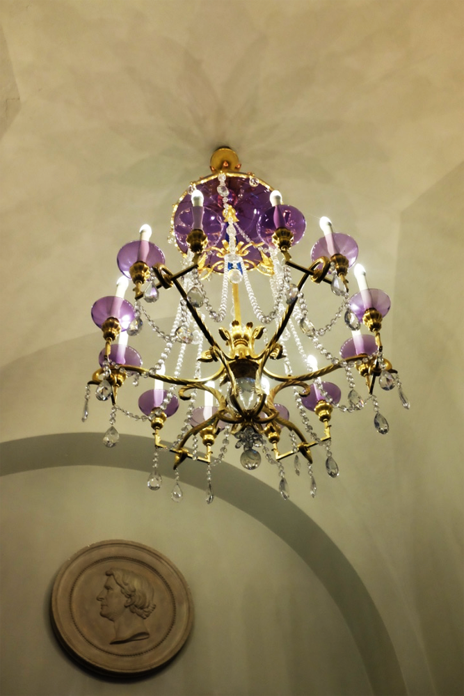 Purple and gold chandelier in Stockholm's city hall